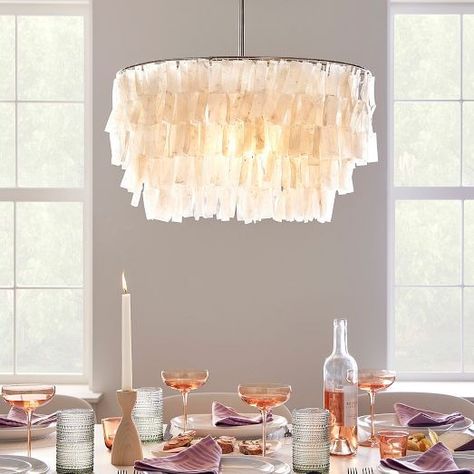 Modern Chandeliers & Island Lights | West Elm West Elm Chandelier, Room Light Fixtures, Capiz Chandelier, Contemporary Chandeliers, Mobile Chandelier, Dining Room Light, Shell Chandelier, Dining Room Light Fixtures, Modern Chandeliers