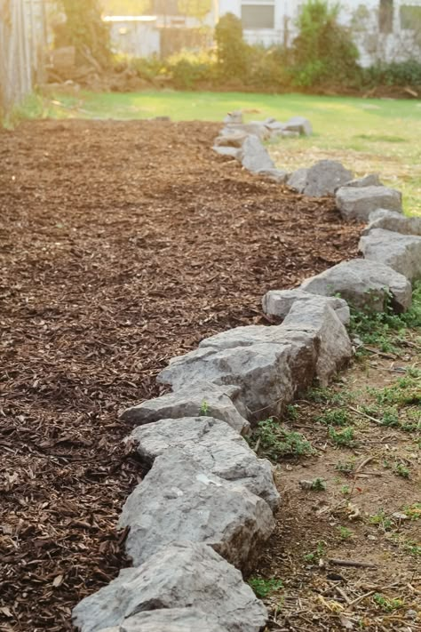 Garden Rock Edging, Garden Bed Rock Edging, Raised Garden Beds Stone Rock Border, Stone Garden Bed Edging, Rocks Around Garden Beds, Rock Flower Bed Borders, Rock Edge Flower Bed Garden Borders, Big Stones In Garden Landscaping, Flower Bed Rock Border