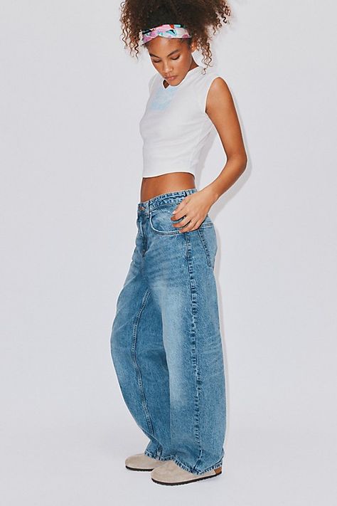 New favorite jeans from BDG – the BDG Bella Baggy Jeans. Overdyed BDG baggy jeans cut in a slouchy with a low-rise that sits comfortably at the hip. Relaxed fit throughout with a baggy silhouette that tapers ever so slightly toward the puddled hem. Complete with contrasting stitching throughout. Urban Outfitters exclusive. Features BDG Bella Baggy Jeans with a slightly tapered leg and overdyed finish Crafted from rigid BDG denim that will soften more and more over time Slouchy low-rise baggy jea Baggy Jeans Outfit, Low Rise Baggy Jeans, Slouchy Jeans, Baggy Jean, Bdg Jeans, Loose Fit Jeans, Cute Everyday Outfits, Streetwear Women, Dream Clothes