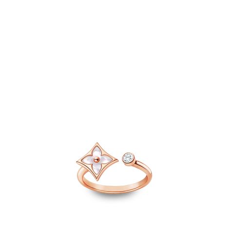 Product details

This Color Blossom Mini Star ring is cast from 18-karat pink gold, set with a white mother-of-pearl motif and a brilliant accent diamond. The mother-of-pearl is finely carved and polished to produce a softly glowing, dimensional surface. The ring’s refined mini size lends itself to mix-and-match styling, for a chic, modern look.

Pink Gold (18 kt)
White Mother-of-Pearl and diamond
1 diamond, ~ 0.04 ct
Motif size: ~ 11 mm
Mirror-polished back engraved with the LV signature Louis Vuitton Ring, Pink Gold Jewelry, Louis Vuitton Gifts, Louis Vuitton Official Website, Louis Vuitton Jewelry, Silver Jewelry Fashion, Louis Vuitton Official, Buckle Shoes, Star Ring