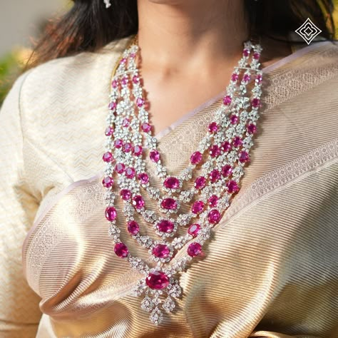 Under the radiant glow of Diwali lights, let your beauty shine with unmatched brilliance. Our exquisite 18K gold necklace, adorned with fancy-shaped diamonds and vibrant pink-red gemstones, captures the essence of the festival. This masterpiece reflects the joy and warmth of traditional celebrations, adding a touch of timeless elegance to your festive attire. WhatsApp 9964641869 for enquiries. 📍Visit the Blue CKC&Co. Flagship store, near Safina Plaza. Look for the DIAMOND logo! Sarees: @h... Diamond Satlada Necklace, Fancy Diamond Earrings, Long Diamond Necklace, Pearl Bangles Gold, Diamond Long Necklace, Diamond Haram, Diamond Jewlery, Stamped Embroidery Kit, Pink Stone Necklace