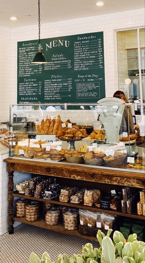 London Stores Aesthetic, Coffee Shop Bakery Display, Countryside Coffee Shop, Bakery Coffee Shop Aesthetic, English Bakery Interior, Coffee Shop Gift Shop, Bakery Case Display, Farmhouse Bakery Shop, Bakery Storefront Design