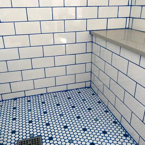 How Colored Grout Can Make Your Bathroom Look More Expensive | Apartment Therapy Penny Tile With Colored Grout, Tile With Colored Grout, Colored Grout White Tile, Colorful Grout, Blue Grout, Duplex Renovation, Colourful Apartment, Large White Tiles, Tile Grout Color