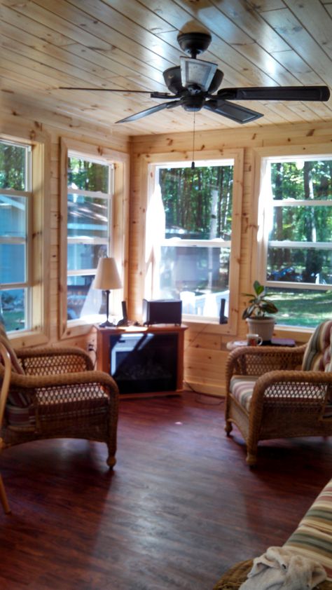 knotty pine sunroom Knotty Pine Sunroom, Log Cabin Porch Ideas, Pine Sunroom, Small Cottage Homes Plans, Knotty Pine Living Room, Country Foyer, Porch To Sunroom, Rustic Sunroom, Small Sunroom