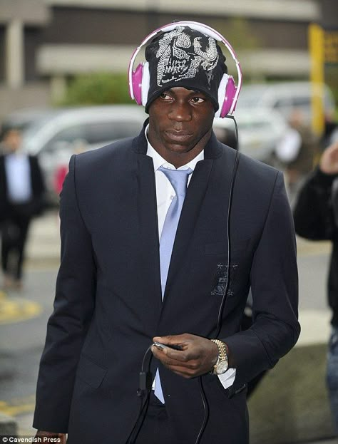 Mario Balotelli undoubtedly deserves the Skinnydipper of the Week title this week, pictured arriving at Manchester airport earlier in the week sporting a pair of hot pink headphones...    Mario, on his way to board a flight to Amsterdam, was also wearing a beanie hat, so his eye-catching headphones were placed over the top.     Mario - why not try our beanie hat headphones? They're more practical, stylish and not as attention-grabbing! Though perhaps the intention was to attract attention... Why Always Me, Mario Balotelli, Football Pics, Conceptual Fashion, Football Fashion, Retro Football, Retro Aesthetic, How To Get Money, Fitness Inspo