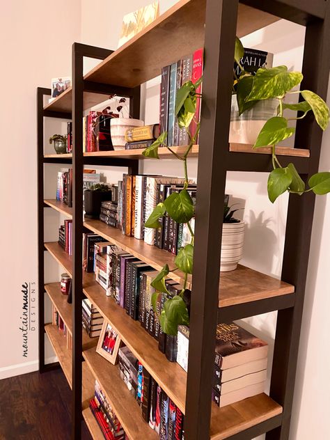 Industrial style bookshelf with black painted ladder uprights and plywood shelves. Bookshelf Building Ideas, Side By Side Bookshelves, Full Wall Bookshelf Diy, Diy Open Shelf Bookcase, Double Sided Bookshelf, Backless Bookshelf, Diy Wood Bookshelf, Free Standing Bookshelves, Double Bookshelf