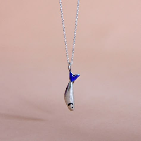 Silver choker necklace with a charm in the shape of a sardine. Blue Enamel The stretched silver chain measures 40cm or 45cm (choose one of two options). NOTE ● Please indicate your phone number in your order. This will help the delivery service to deliver your order. ➤ All our designs are handmade, the color may be slightly different from one to another and from the ones shown in the photo. The piece shown in the picture is not real size. The photo has been enlarged to show the details of the de Silver Necklace With Pendant, Handmade Silver Pendant, Handmade Silver Necklace, Choker Necklace Silver, Silver Charm Necklace, Fish Necklace, Silver Choker Necklace, Chocker Necklace, Blue Pendant