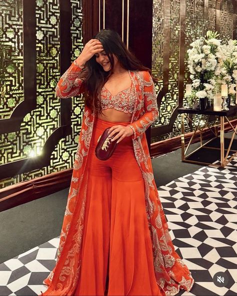 #FashionMistakes #StyleErrors #FashionFauxPas #WardrobeMistakes #FashionDonts #OutfitBlunders #StyleTips Haldi Trending Outfits, Poses In Indo Western Dress, Western Indian Outfits Women, Crop Tops For Lehenga Indian Weddings, Western Wedding Ideas Dresses, Orange Indian Lehenga, Women Haldi Outfit, Ethnic Indo Western Outfits, Destination Wedding Indian Outfits