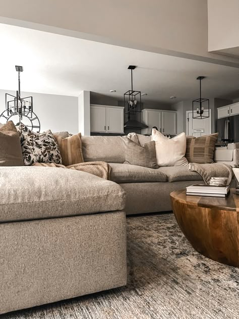 Browns And Beige Living Room, Living Room Tan Sectional, Neutral Color Living Room Ideas Cozy, Browns And Cream Living Room, Large Beige Sectional Living Room, Sectional Living Room Ottoman, Dark Beige Sofa Living Room Ideas, Neutral Couch Living Room Cozy, Dark Couch In Living Room