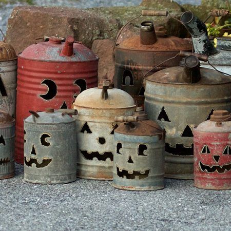 Vintage antique gas cans with jack-o-lantern faces cut into each by Tish, Mike and Ian Bachleda. Selection varies. Oil Can Jack O Lantern, Pumpkin Gas Cans, Oil Can Pumpkins, Tin Can Jack O Lantern, Gas Can Pumpkins Diy, Metal Gas Can Ideas, Pumpkins Made From Tin Cans, Old Metal Gas Can Ideas, Gas Can Jack O Lantern