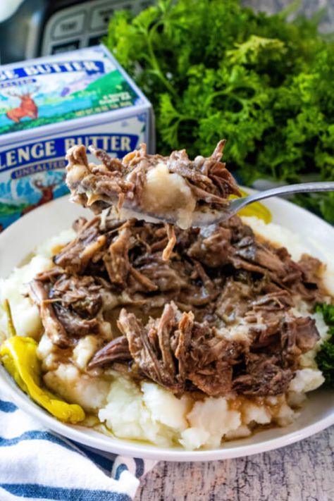 This Slow Cooker Mississippi Pot Roast is the easiest and most delicious pot roast you'll ever make! This popular recipe is FULL of flavor! Shredded Beef And Mashed Potatoes, Shredded Beef Over Mashed Potatoes, Beef With Mashed Potatoes, Food Crockpot Recipes, Slow Cooker Mississippi Pot Roast, Mississippi Roast Recipe, Delicious Pot Roast, Crock Pot Roast, Best Spaghetti Sauce