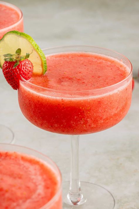 This Frozen Strawberry Daiquiri is what summer dreams are made of. Made with real strawberries, homemade simple syrup, white rum, and fresh lime juice, anyone can make this classic daiquiri cocktail recipe! No triple sec, limeade concentrate, or orange liqueur required. Classic Daiquiri, Homemade Simple Syrup, Strawberry Daiquiri Recipe, Frozen Strawberry Daiquiri, Daiquiri Recipe, Daiquiri Cocktail, Homemade Pita, Homemade Pita Bread, Frozen Cocktail Recipes