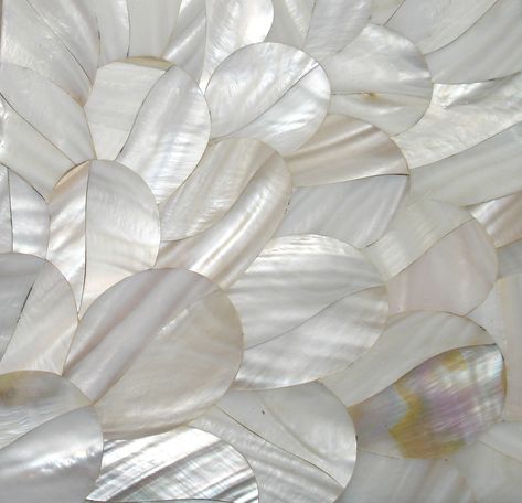 Pearl plumage. We adore the captivating feather-like effect of this gorgeous mother-of-pearl inlay. ⁠ ⁠ This finish can be used across in a variety of settings, from draw-fronts and doors in joinery and would look particularly elegant in a bathroom or master bedroom suite. ⁠ ⁠ #fameedkhalique #luxurymaterials Mother Of Pearl Bathroom, Pearls Aesthetic, Murmuration Art, Pearl Aesthetic, Pale Aesthetic, Mother Of Pearl Inlay, Wedding Photo Booth, Pearl Inlay, Lifestyle Accessories