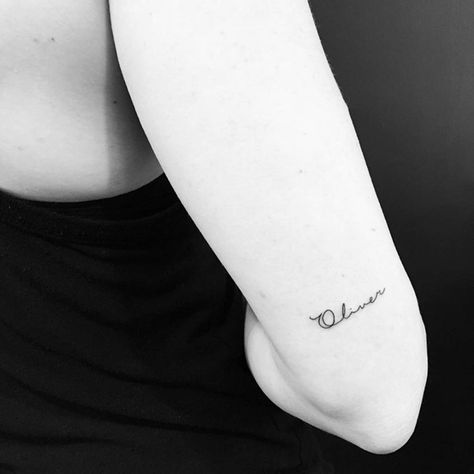 Name On Back Of Arm Tattoo, Name Tattoo Back Of Arm, Olive Name Tattoo, Oliver Tattoo Name, Letter O Tattoo, O Tattoo Letter, Name Tattoo Arm, Oliver Tattoo, Arm Tattoos Lettering