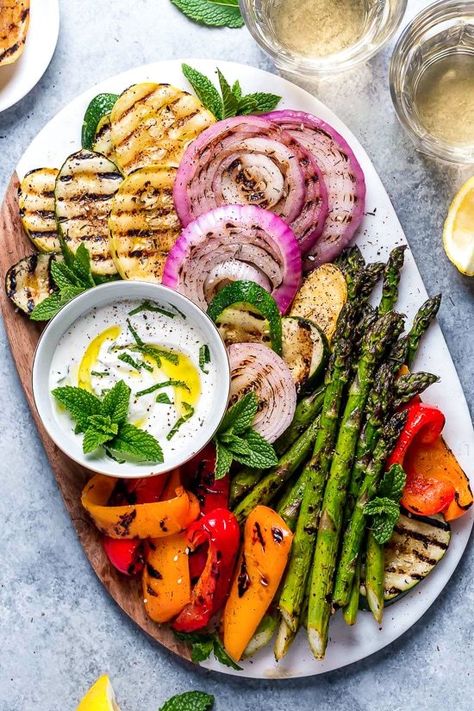 Grilled Vegetables with Yogurt Mint Sauce are so colorful and delicious. An easy summer side dish made with asparagus, zucchini, squash, red onion and bell peppers. Asparagus Zucchini, Grilled Vegetable Recipes, Easy Summer Side Dishes, Grilled Asparagus Recipes, Vegetable Platter, Mint Sauce, Zucchini Squash, Summer Side Dishes, Asparagus Recipe