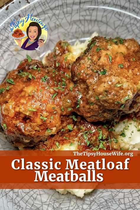 The photo shows a delicious plate of tender classic meatloaf meatballs atop a bed of mashed potatoes and gravy. The brightly colored banner displays the name of the recipe: Classic Meatloaf Meatballs. Classic Meatloaf Meatballs Tipsy Housewife, Drip Beef Meatballs Pioneer Woman, Traditional Meatballs, The Tipsy Housewife, Tipsy Housewife, Meatloaf Meatballs, Classic Meatloaf, Beef Meatballs, Frozen Meatballs