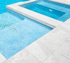 Pool Tile Company Sells Pool Tiles, Mosaic, Stone & Porcelain Tiles White Pool Tile Waterline, White Pool Tile, Pool Tile Waterline, Pool Coping And Tile, Pools And Patios, White Pool, Pool Pavers, Paver Tiles, Stone Pool