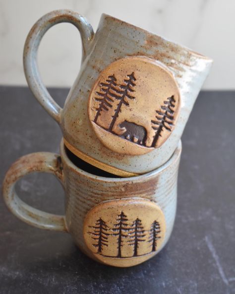 #cottagecore #pottery #ceramics #mug #blue #woods #cabin #bear #trees #pinetrees Bear Ceramic Mug, Cute Mugs Ceramics, Ceramics Mug Ideas, Clay Mugs Handmade, Cottagecore Pottery, Bear Pottery, Nature Pottery, Bear Mugs, Ceramics Mug