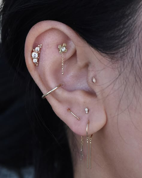 Styled this ear many moons ago! Today we upgraded the Faux Rook to “Grace” by @mayajewelry ✨ So many new designs and styles from the safe… | Instagram Upper Earlobe Piercing, Maximalist Earring Stack, Ear Piercing Designs, Full Ear Piercings, Piercing Designs, Aesthetic Piercings, Ear Project, Flat Piercing, Ear Curation