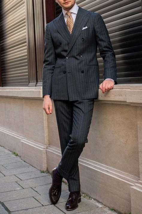 This charcoal pinstripe suit outfit is the perfect outfit for groom attire as well as buisness attire. A double breasted pinstripe suit like this will grab the attention of everyone you pass by. If you would like a suit like this custom made for you, book an appointment online with us at Giorgenti New York! Charcoal Double Breasted Suit, Vintage Pinstripe Suit, Suit Double Breasted, Pinstripe Double Breasted Suit Men, Charcoal Pinstripe Suit, Dark Grey Pinstripe Suit Men, Suit And Scarf Men, Black Pinstripe Suit Men, Charcoal Suit Men