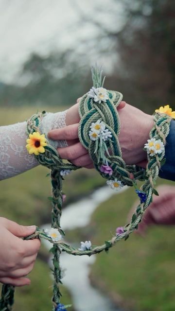 Ceotha | Handfasting Cords on Instagram: "Which cord from our NEW Spring collection are you tying the knot with?   Shop these cords via the Etsy link in our bio! Under the Spring 2024 collection.   #floralwedding #handfasting #handfastingceremony #floralsinspring #handfastingcord #forestmeadow #roses" Celtic Knot Tying Ceremony, Handfasting Pictures, Handfasting Ceremony Aesthetic, Tying The Knot Ceremony, Knot Tying Ceremony Wedding, Wedding Knot Tying Ceremony, Handfasting Photos, Hand Tying Ceremony, Hand Fasting Cord