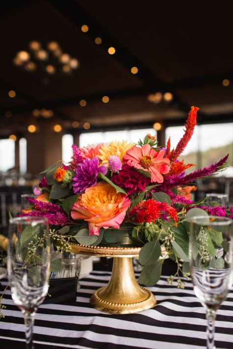 purple, orange, pink, colorful geometric, black and white stripes wedding centerpiece Black And White Wedding With Colorful Flowers, Pink And Orange Table Setting, White And Gold Wedding Themes, Orange Wedding Decorations, White Stripes Wedding, Orange And Pink Wedding, Orange Table, Hot Pink Weddings, Tall Wedding Centerpieces