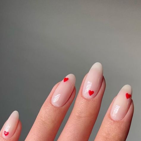 Sarah Haidar on Instagram: "dainty lil ❤️s, leaning towards simpler looks for valentines!! inspo from pinterest —— #valentinesnails #nailinspo #naildesigns #heartnails #almondnails #nails" Red Heart Nail Designs, Cute Nails Winter, Red Heart Nail Art, Heart Nail Ideas, Almond French Tips, Cute Heart Nails, Nail Ideas Red, Theme Nails, Heart Nail Designs