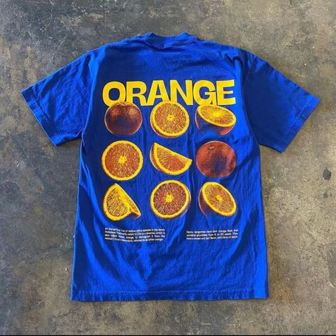 orange, blue t-shirt with oranges, different t-shirts with cool prints, currently fashionable t-shirts, converse, carhartt, timotée chalamet Tee Shirt Outfit, Style Parisienne, Mode Hippie, Shirt Design Inspiration, Orange T Shirts, Orange Shirt, Orange Flower, Mode Inspo, 가을 패션