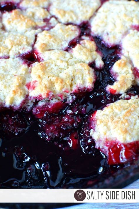 Blackberry cobbler with fresh blackberries and a homemade biscuits topped with course sugar, is a delicious dessert that takes the place of pie in a pinch. Cobbler is super holiday friendly and often served as a fall dessert. You won’t believe how easy it is to make the best blackberry cobbler ever so let’s getContinue Reading Southern Blackberry Cobbler, Blackberry Dessert Recipes, Easy Blackberry Cobbler, German Chocolate Pies, Strawberry Angel Food Cake, What For Dinner, Berry Cobbler Recipes, Peach Cobbler Dump Cake, Blackberry Dessert