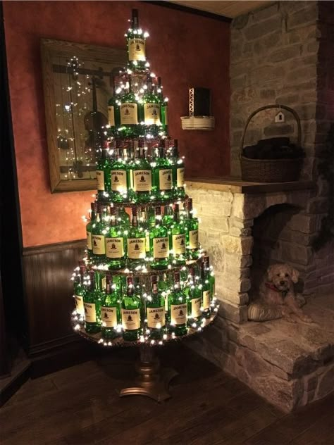 VSCO - Our Jameson Irish Whiskey bottle christmas tree in our Ould Sod Pub!!!!!! Feature our Irish Lucky dog!!!! | katefitz51 Christmas Tree For Cabin, Irish Pub Christmas Decor, Christmas Decorations Bar Restaurant, Irish Pub Decor Ideas, Liquor Store Christmas Decorations, Irish Christmas Tree, Pub Christmas Decor, Christmas Pub Decorations, Pub Christmas Decorations