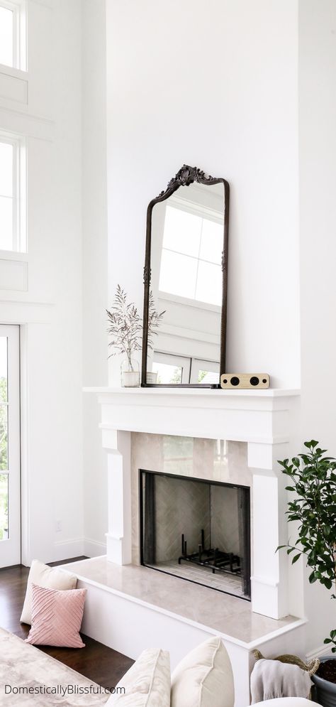 10 oversized mirrors you will love that will look gorgeous above your fireplace mantel. Tall Mirrors Over Fireplace, Tall Mirror Over Fireplace, Tall Mirror Above Fireplace, Mantle Decor Tall Ceiling, Tall Fireplace Design Ideas, Large Mirror On Mantle, Mirrors On Fireplace Mantel, Mirrors Above Fireplace Mantle, Large Mirror Above Fireplace