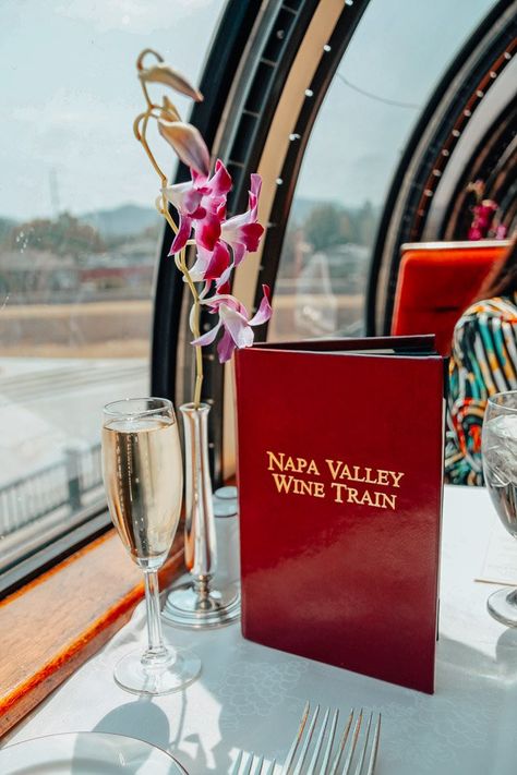 A glass of champagne on the Napa Valley Wine Train in Napa, CA. Wine Train Napa Valley, Napa Wine Train, Napa Chic, Napa Valley Aesthetic, Wine Tour Bachelorette, Things To Do In Napa, Nappa Valley, Travel 2025, Napa Vineyards