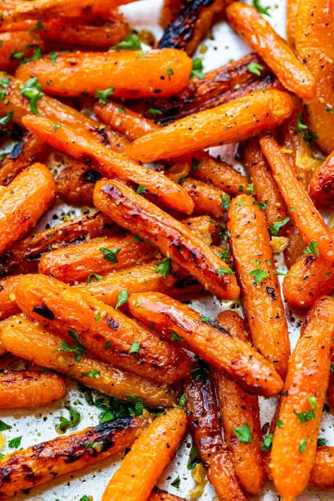 The combination of sweet and savory in these honey garlic roasted carrots is exactly the flavor you crave in a side dish! #roastedcarrots #carrotsrecipe #honeyroastedcarrots Honey Roasted Garlic Carrots, Roasted Carrots Stovetop, Blackstone Carrots, Honey Dill Carrots, Honey Garlic Butter Roasted Carrots, Honey Carrots Roasted, Carrot Marinade, Hot Honey Roasted Carrots, Sheet Pan Carrots