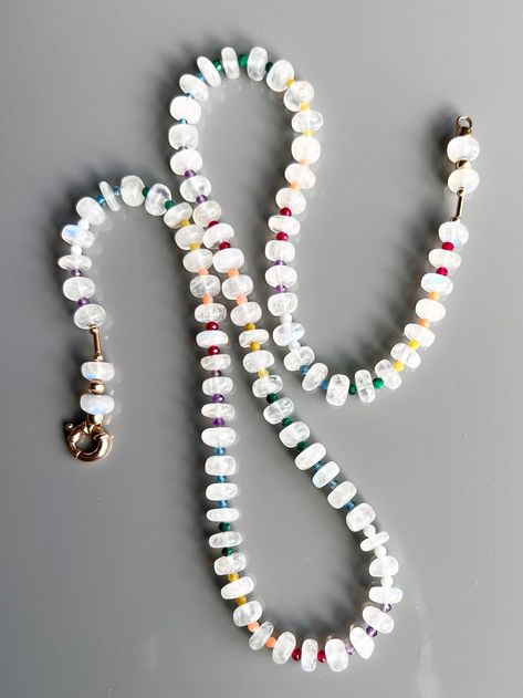 this ever-popular necklace is versatile and perfect for adding a special touch to any look; layer it with chains and pendants to construct a custom aesthetic. moonstone with 14k gold findings and stones such as opal, chrysoprase, ruby, jade, malachite, London Blue Quartz, turquoise, aquamarine, sapphire, and quartz lend a colorful flair to this exciting mix....#of #Exploring #Beauty #Jewelry #World #Unveiling #Art #the #Gemstone #Organizers #Tidiness #Natures #the #Allure #of #the #Treasures Gemstone Bead Jewelry, Rondelle Necklace, Moonstone Gemstones, Popular Necklaces, Rainbow Moonstone Necklace, Natural Gemstone Necklace, Rainbow Jewelry, Bead Pendant, Natural Stone Jewelry