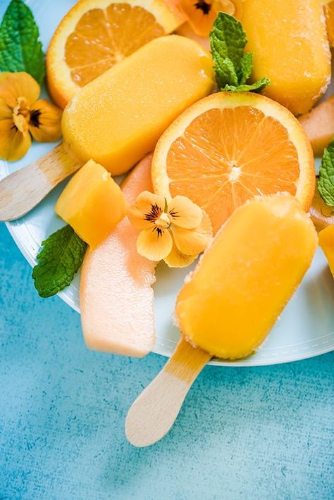 Ice lollies are easy to make and children and grandchildren will love helping out. They’re also healthier and cheaper than shop-bought versions... Orange Popsicles, Jelly Roll Race, Embroidery Products, Goods Design, Ice Lollies, Tangerine Dream, Hand Work Design, Sweet Orange Essential Oil, Vanilla Essential Oil