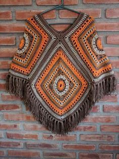 Crochet Granny Square Poncho Pattern | DIY Poncho Guide Diy Crochet Poncho, Granny Square Poncho, Crochet Baby Poncho, Poncho Design, Poncho Patterns, Crochet Poncho Free Pattern, شال كروشيه, Poncho Crochet, Crochet Baby Cardigan