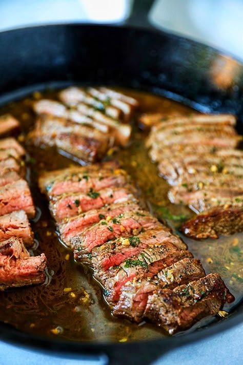 This Flank Steak Recipe is so easy and perfect for busy weeknights. An affordable flank steak is portioned and cooked quickly in a traditional cast iron pan and elevated to restaurant quality with a quick and delicious garlic butter sauce. Skillet Flank Steak, Flank Steak Recipes Oven, Flank Steak Oven, Steak Recipes Oven, Flank Steak Recipe, Flank Steak Tacos, Marinated Skirt Steak, Broiled Steak, Steak Fajita Recipe