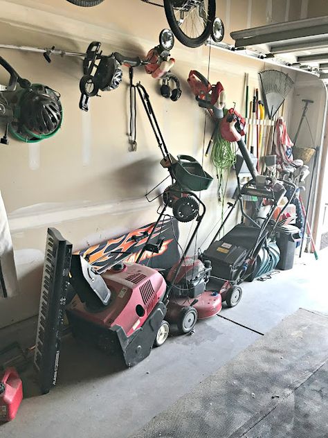 Organizing Sports Equipment In Garage, Garage Organization For Lawn Equipment, Garage Organization Ideas Lawn Equipment, Garage Equipment Storage, Lawn Tools Organization, Diy Rake And Shovel Holder, Garage Yard Tool Storage, Garage Organization Yard Tools, Storing Lawn Chairs In Garage