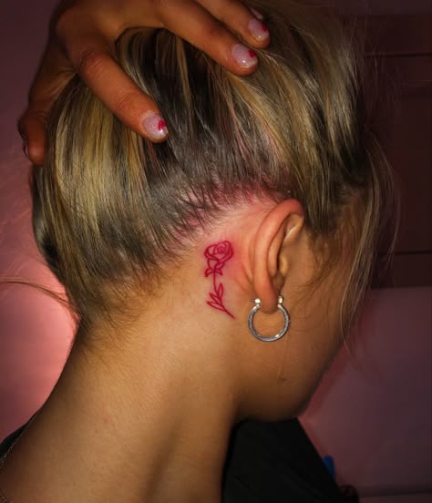 red rose tattoo behind ear Red Rose Tattoo Behind Ear, Guinea Pig Tattoo, Behind Ear Tats, Rose Tattoo Behind Ear, Rose Neck Tattoo, Flower Neck Tattoo, Ear Tats, Business Baddie