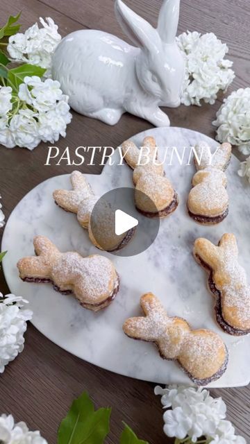 Micah Enriquez on Instagram: "Puff Pastry Bunnies 🤩 How to make them:  Ingredients: • 2 puff pastry sheets thawed to room temperature (I prefer the Pepperidge Farm brand of pastry sheets)  • Nutella (I warm it up for about 30 seconds in the microwave to make it easier to spread) • 1 tbs of melted butter and 1 egg for an egg wash (optional)  • Powdered sugar   1. Preheat oven to 375 degrees  2. Roll out pastry dough and spread the Nutella on the dough  3. Lay another pastry sheet on top  4. Cut bunny shapes with a cookie cuter 5. Brush on the egg/butter wash  6. Cook for about 10-12 minutes or until browned on top but watch it for burnjng. Let cool and then sprinkle on the powdered sugar. Enjoy!   #Easterbunny #puffpastry #nutella #trending #foryou #pastry #easyrecipe #momlife" Easter Pastries, Nutella Puff Pastry, Egg Butter, Puff Pastry Desserts, Easter Lunch, Nutella Cookies, Chocolate Croissant, Pepperidge Farm, Ham Cheese