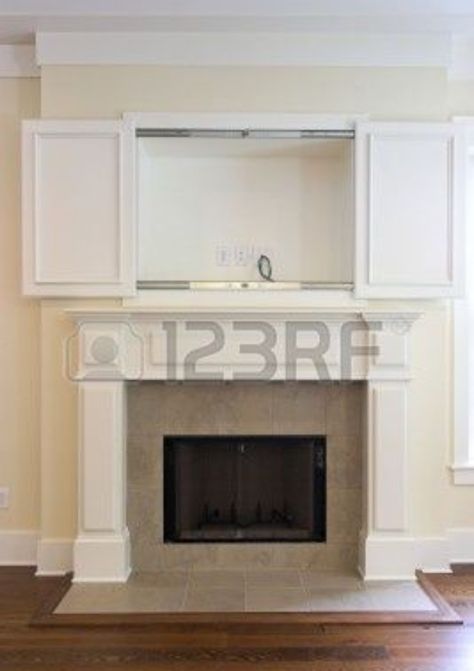 Storage above fireplace Tv Above Fireplace, Hide Tv, Tv Over Fireplace, Tv Wall Cabinets, Open Cabinet, Hidden Tv, Photographers Gallery, Fireplace Remodel, 아파트 인테리어