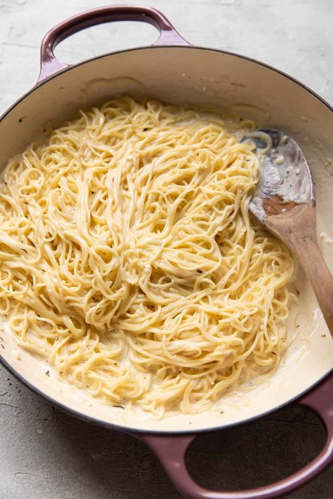 This easy creamy angel hair pasta will become a family side dish favorite! You will love how rich and creamy the pasta is and it takes less than 30 minutes to prepare. Angel Hair Parmesan Pasta, Angel Hair Pasta Aesthetic, Easy Angel Hair Pasta Recipes Simple, Cajun Angel Hair Pasta, Angel Hair Alfredo Pasta, Simple Angel Hair Pasta Recipes, Creamy Angel Hair Pasta Recipes, Angel Hair Pasta Recipes Easy, Creamy Angel Hair Pasta