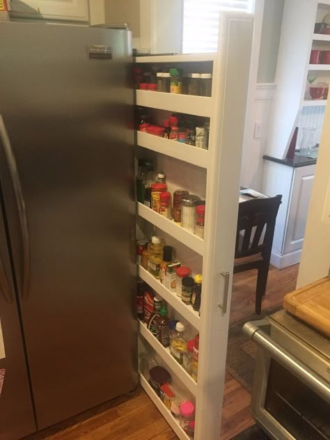 Custom Pull Out Spice Rack Tucked on the Side of Our Refrigerator. Pantry Redo, Pull Out Spice Rack, Diy Spice Rack, Cabinet Trim, Kitchen Spice Racks, Diy Spices, Small Pantry, Spice Cabinet, Refrigerator Storage