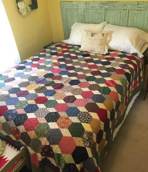 As promised, today I am taking a look back at some of my bigger hexie quilts. The first one shown here was made for a dear friend. All the fabrics are from Denyse Schmidt’s lines. My version …