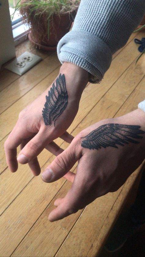 Thumb wings By Jonathan Casta at Deja Vu in Winston Salem Nc Deja Vu Tattoo, Nc Tattoo, Wing Tattoo Men, Thumb Tattoos, Tattoo Floral, Cool Wrist Tattoos, Hand And Finger Tattoos, Cute Hand Tattoos, Tattoo Wrist