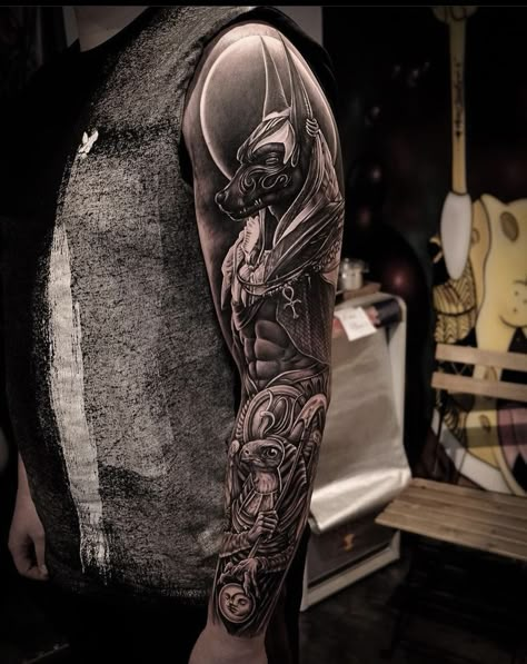 Anubis Tattoo With Scale, Anubis Tattoo Sleeve Arm, Egyptian Tattoo Sleeve Men Arm, Ancient Egypt Tattoo Sleeve, Anubis Sleeve Tattoo, Amun Ra Tattoo, Anubis Tattoo Men Ideas, Egyptian Mythology Tattoo, Egyptian Sleeve Tattoo