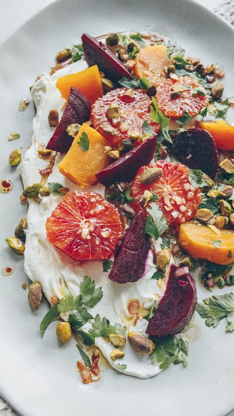 Easy to make, and make ahead, this salad is as beautiful to look at as it is an experience to eat. Sweet, tangy, syrupy, beautifully hued beets and blood oranges are layered atop a rich and creamy Labneh backdrop, punctuated by the crunch of pistachios. See More Low Carb, Keto Salad Recipes at A Cultivated Living Roasted Beet Salad, Healthy Probiotics, Orange Salad, Beet Salad, Roasted Beets, Food Inspo, Blood Orange, Beets, Food Inspiration