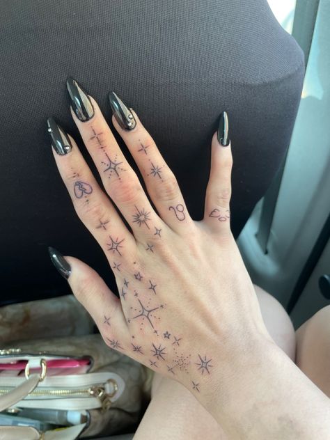 Hand Tattoos Astrology, Magic Finger Tattoo, Astrological Hand Tattoo, Astrology Finger Tattoos For Women, Dots Hand Tattoo, Starry Hand Tattoo, Mystical Hand Tattoo, Dainty Hand Tattoos Fingers, Star On Hand Tattoo