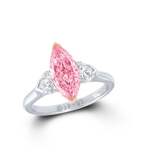 Graff marquise-cut pink centre diamond ring featuring two white diamonds. Graff Pink Diamond Ring, Graff Ring, Graff Engagement Ring, Graff Jewelry, Fancy Diamond Ring, Graff Diamonds, Colored Diamond Jewelry, Unusual Engagement Rings, Titanic Jewelry