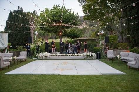 Outdoor Dance Floor Under Strings of Lights    Photography: Lane Dittoe… Band Stage, Outdoor Dance Floors, Dance Floor Lighting, Backyard Wedding Decorations, Wedding Dance Floor, Diy Your Wedding, Lights Photography, Backyard Reception, Dance Floor Wedding